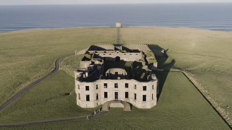 An aerial photograph of Downhill House and Mussenden Temple.